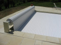 Persiana enrollable sobre suelo "Sylver Roll" para piscina Aruba